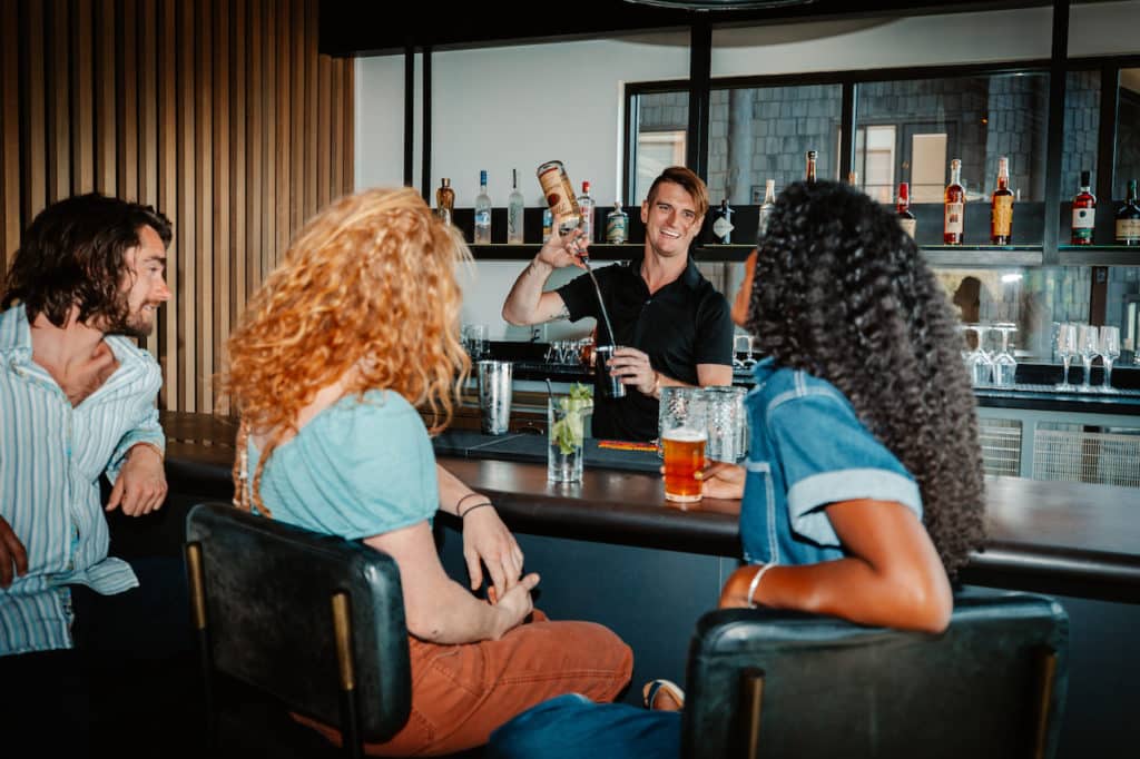 People enjoying drinks at bar
