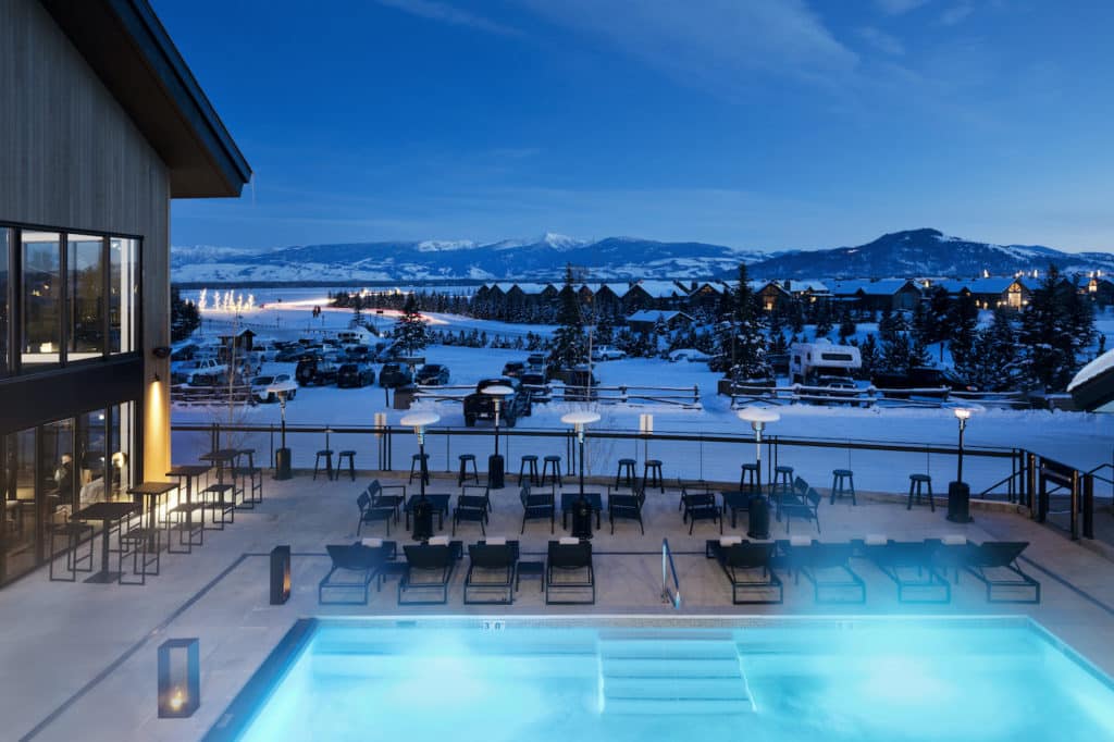 Pool at night with view of the moutains