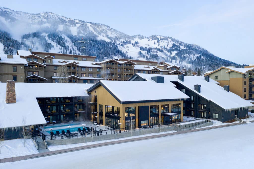 wide angle shot of hotel and mountain