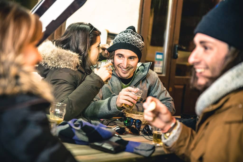 Friends enjoying apres beers